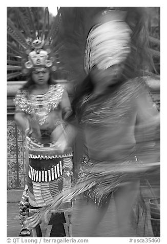 Aztec dancers with motion blur. Los Angeles, California, USA