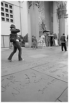 Footprints and handprints of Jack Nicholson in the Grauman theatre forecourt. Hollywood, Los Angeles, California, USA ( black and white)