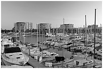 Yachts and appartment buildings at sunrise. Marina Del Rey, Los Angeles, California, USA (black and white)