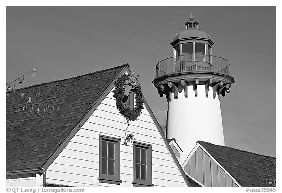 Brighly painted houses and lightouse, Fishermans village. Marina Del Rey, Los Angeles, California, USA (black and white)