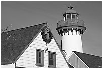 Brighly painted houses and lightouse, Fishermans village. Marina Del Rey, Los Angeles, California, USA ( black and white)