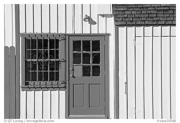 Facade of house with blue doors and windows. Marina Del Rey, Los Angeles, California, USA