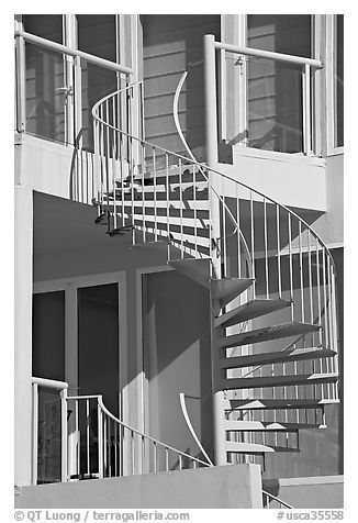 Facade detail of beach house with spiral stairway. Santa Monica, Los Angeles, California, USA (black and white)