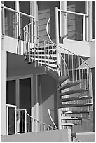 Facade detail of beach house with spiral stairway. Santa Monica, Los Angeles, California, USA (black and white)