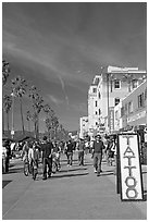 Tatoo sign and colorful Ocean Front Walk. Venice, Los Angeles, California, USA ( black and white)