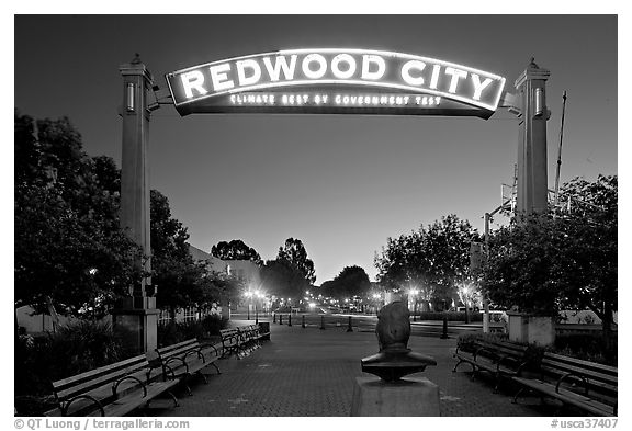 Broadway Street with Best Climate neon sign at dusk. Redwood City,  California, USA (black and white)