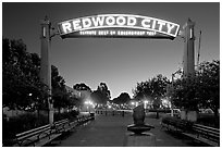 Broadway Street with Best Climate neon sign at dusk. Redwood City,  California, USA ( black and white)