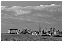 Yachts and industrial installations, port of Redwood, sunset. Redwood City,  California, USA (black and white)