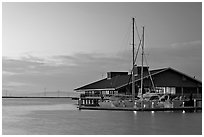 Marina building and yachts, sunset. Redwood City,  California, USA (black and white)