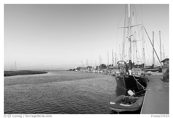 Yachts and Bair Island wetlands, sunset. Redwood City,  California, USA (black and white)