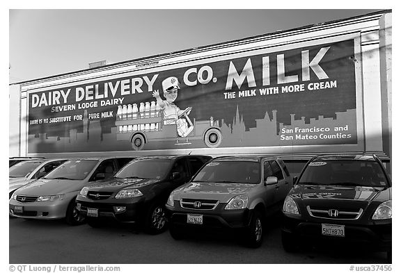 Historic advertising mural, in a car dealership lot. Burlingame,  California, USA