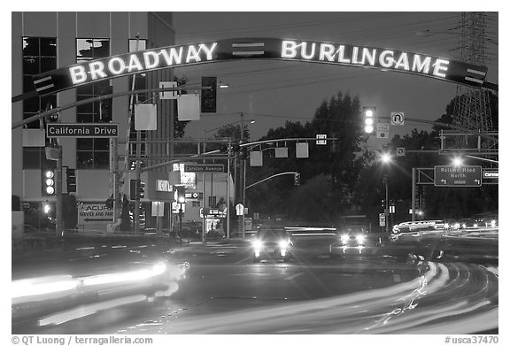 Broadway at night with lights from moving cars. Burlingame,  California, USA (black and white)