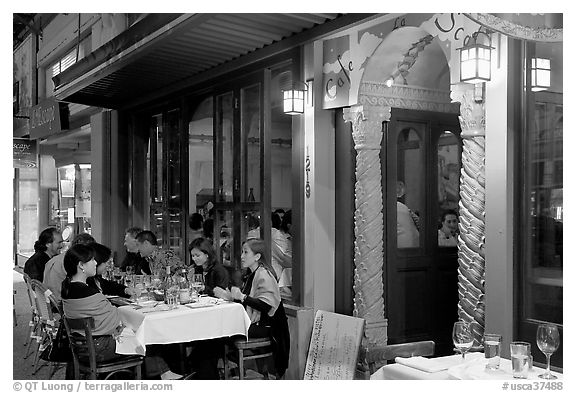 Outdoor table of Italian restaurant at night. Burlingame,  California, USA (black and white)