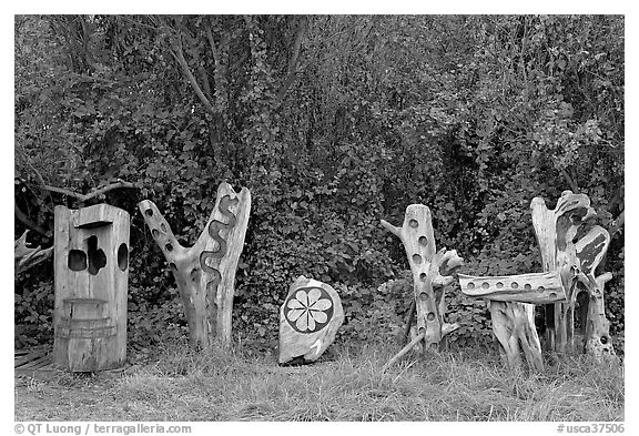 Wood carvings in garden. Half Moon Bay, California, USA (black and white)