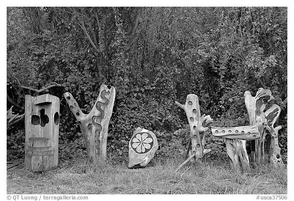 Wood carvings in garden. Half Moon Bay, California, USA