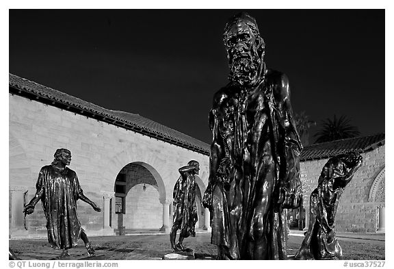 Rodin Burghers of Calais in the Main Quad at night. Stanford University, California, USA (black and white)