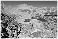 Backpackers hiking up from Saddlebag Lakes, John Muir Wilderness. California, USA (black and white)