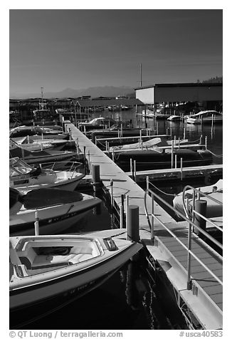 Small boats and dock, Sunnyside marina, Lake Tahoe, California. USA (black and white)