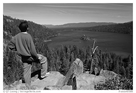 Man standing above Emerald Bay, Lake Tahoe, California. USA (black and white)