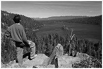 Man standing above Emerald Bay, Lake Tahoe, California. USA ( black and white)