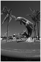 Dolphin statue and wharf. Santa Barbara, California, USA ( black and white)