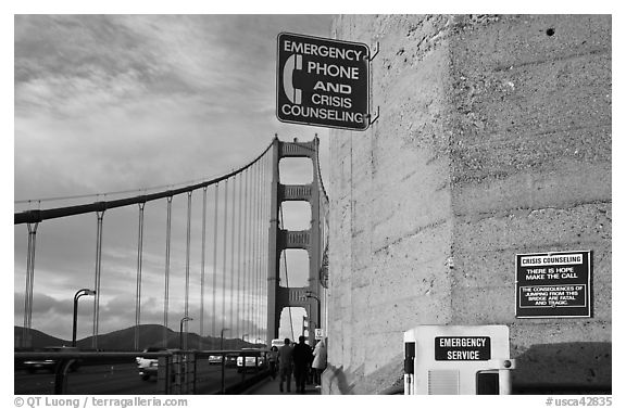 Suicide prevention signs on Golden Gate Bridge. San Francisco, California, USA (black and white)