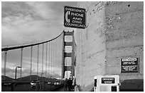 Suicide prevention signs on Golden Gate Bridge. San Francisco, California, USA (black and white)