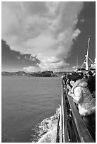 On tour boat cruising towards Alcatraz Island. San Francisco, California, USA (black and white)