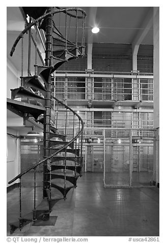 Spiral staircase inside Alcatraz prison. San Francisco, California, USA (black and white)