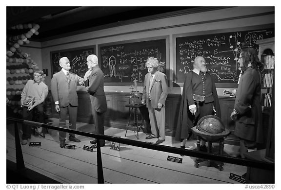 Wax figures of scientists with one outlier, Madame Tussauds. San Francisco, California, USA (black and white)