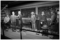 Wax figures of scientists with one outlier, Madame Tussauds. San Francisco, California, USA (black and white)