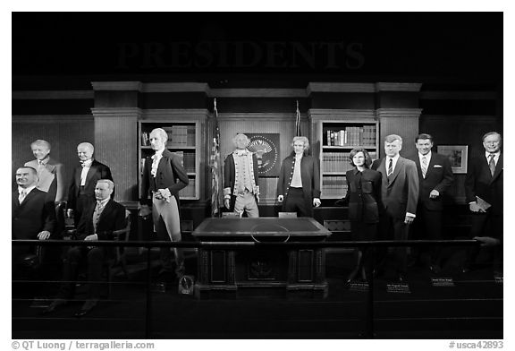 Wax figures of presidents with one outlier, Madame Tussauds. San Francisco, California, USA (black and white)