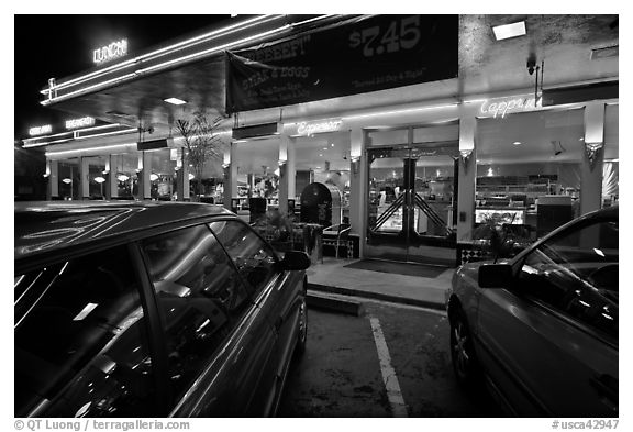 Cars and neon light of dinner at night. San Francisco, California, USA