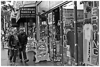 Sidewalk with bohemian-looking people. San Francisco, California, USA (black and white)