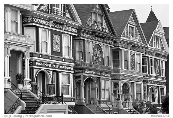 Row of elaborately decorated victorian houses. San Francisco, California, USA (black and white)