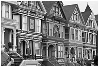 Row of elaborately decorated victorian houses. San Francisco, California, USA (black and white)