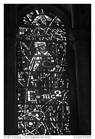 Stained glass window with Einstein figure and famous energy equation, Grace Cathedral. San Francisco, California, USA