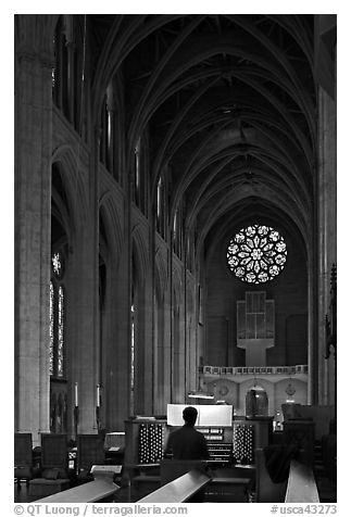 Organist, nave, and rose window, Grace Cathedral. San Francisco, California, USA (black and white)