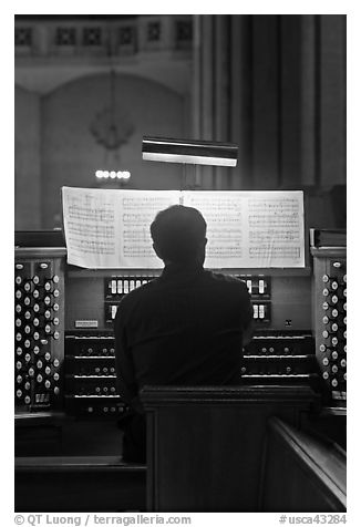 Musician playing organ, Grace Cathedral. San Francisco, California, USA (black and white)