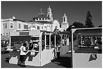 School fair booths and Mission Dolores in the background. San Francisco, California, USA ( black and white)