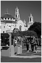 School fair booth, children, and Mission Dolores in the background. San Francisco, California, USA ( black and white)
