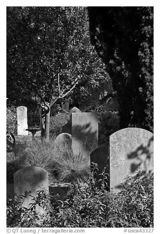 Headstones in the garden of Mission San Francisco de Asis. San Francisco, California, USA (black and white)