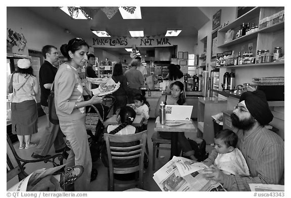 Inside pizzaria with Make love not war inscription, Haight-Ashbury district. San Francisco, California, USA (black and white)