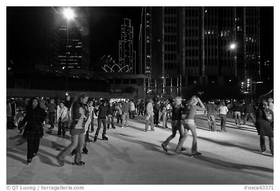 Holiday ice rink at night, Embarcadero Center. San Francisco, California, USA