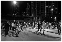 Holiday ice rink at night, Embarcadero Center. San Francisco, California, USA ( black and white)