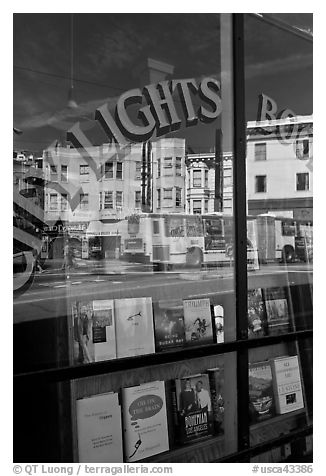 City Light Bookstore storefront with street reflections, North Beach. San Francisco, California, USA (black and white)