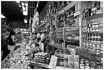 Italian grocery store interior with customers, Little Italy, North Beach. San Francisco, California, USA (black and white)