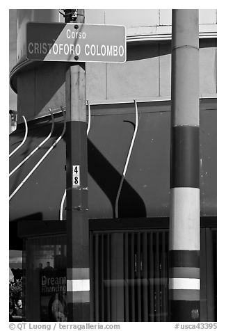 Italian flags painted on lamp posts and name of street in Italian, Little Italy, North Beach. San Francisco, California, USA