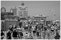 Summer crowds on Santa Monica Pier. Santa Monica, Los Angeles, California, USA (black and white)