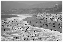 Many people bathing in surf at Santa Monica Beach. Santa Monica, Los Angeles, California, USA ( black and white)